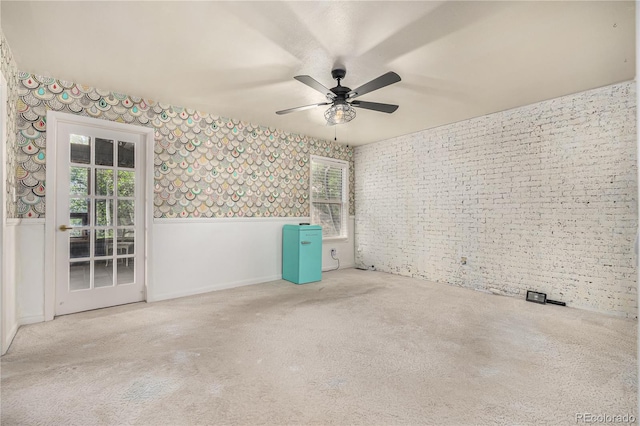 19 Rock Ln, Castle Rock, CO 80104 - carpeted spare room with a ceiling fan and a wainscoted wall