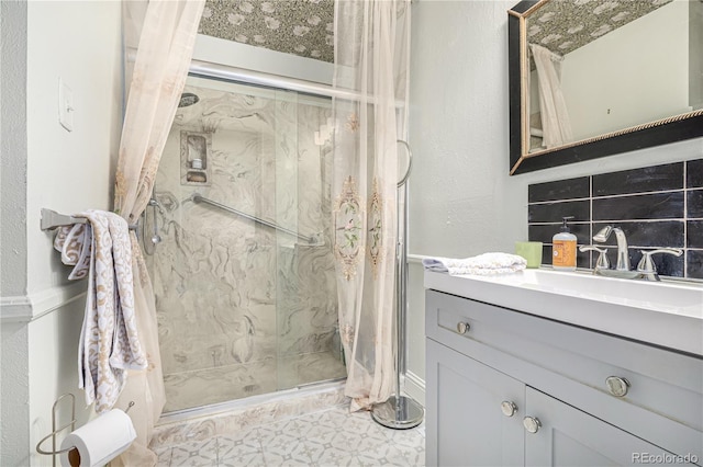 19 Rock Ln, Castle Rock, CO 80104 - full bathroom with a shower stall, vanity, and a textured wall