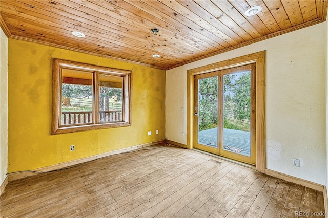 12524 Hilltop Pl, Kiowa, CO 80117 - unfurnished room with crown molding, wooden ceiling, hardwood / wood-style floors, baseboards, and recessed lighting