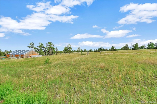 12524 Hilltop Pl, Kiowa, CO 80117 - view of yard with a view of rural / pastoral area, an outdoor structure, and a pole building