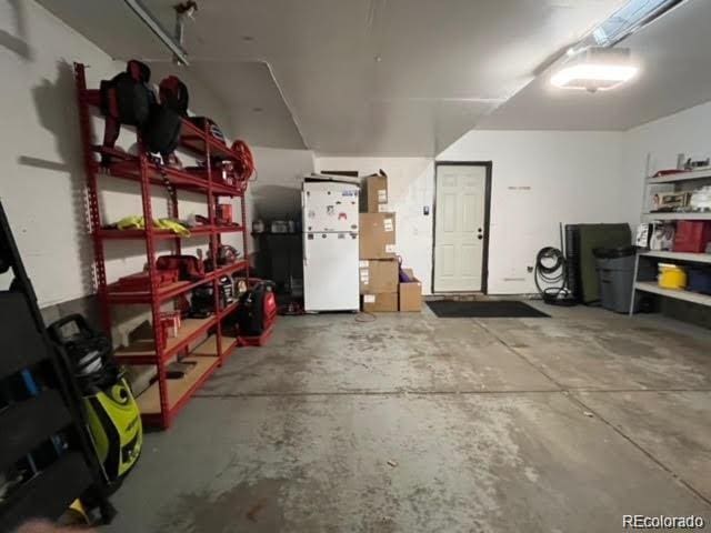 garage featuring freestanding refrigerator