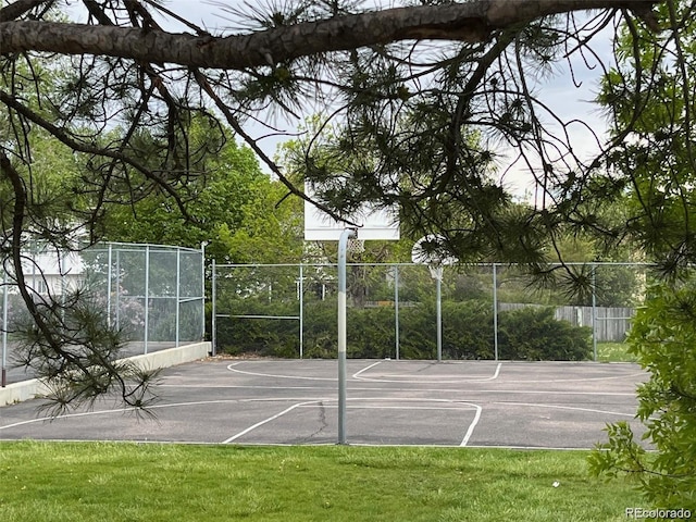 view of sport court featuring community basketball court and fence