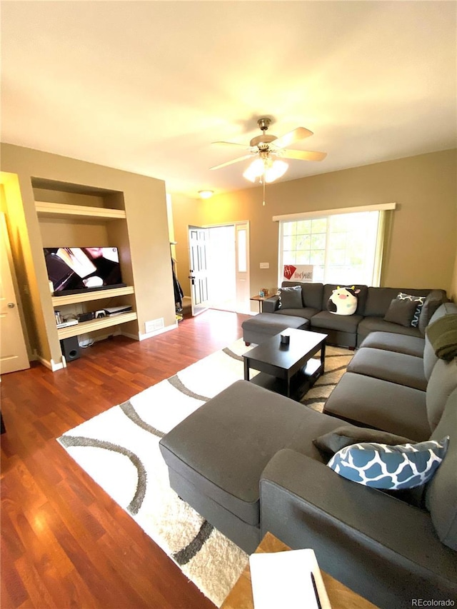 19246 E Idaho Pl Unit 102, Aurora, CO 80017 - living area featuring ceiling fan, wood finished floors, and built in features