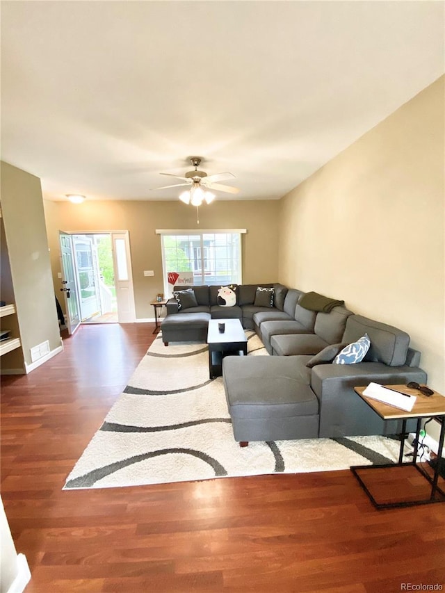 19246 E Idaho Pl Unit 102, Aurora, CO 80017 - living area with wood finished floors and ceiling fan