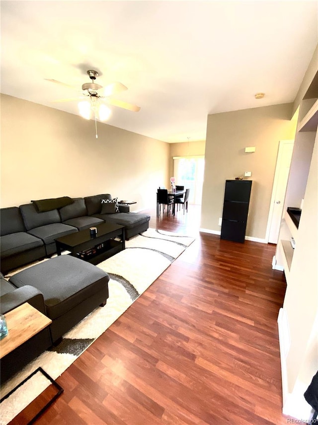 19246 E Idaho Pl Unit 102, Aurora, CO 80017 - living area featuring wood finished floors and ceiling fan