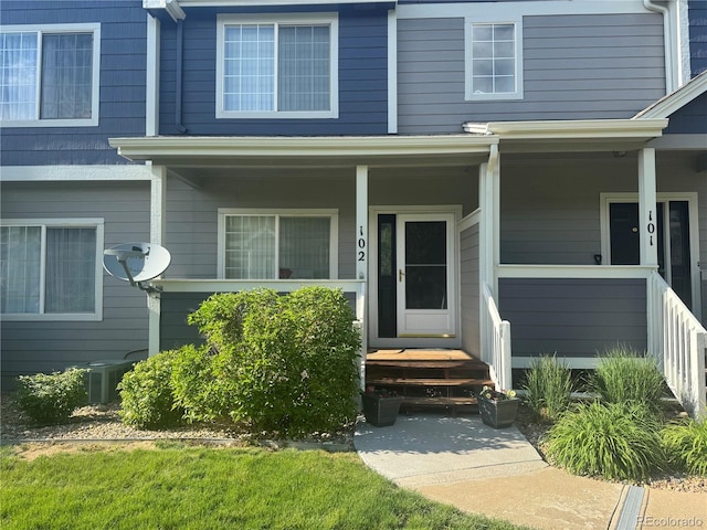 19246 E Idaho Pl Unit 102, Aurora, CO 80017 - doorway to property featuring a porch