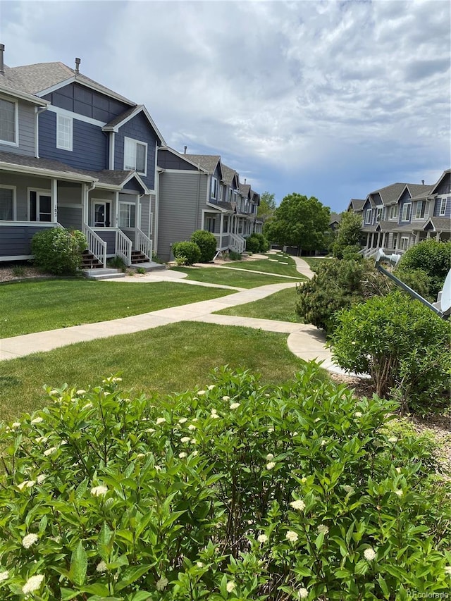19246 E Idaho Pl Unit 102, Aurora, CO 80017 - view of community featuring a residential view and a lawn