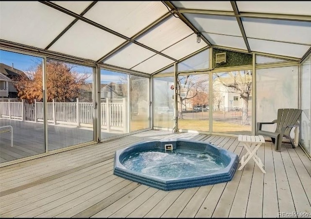 19246 E Idaho Pl Unit 102, Aurora, CO 80017 - sunroom with a hot tub and lofted ceiling