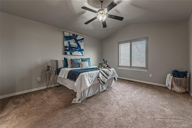 carpeted bedroom featuring lofted ceiling and ceiling fan