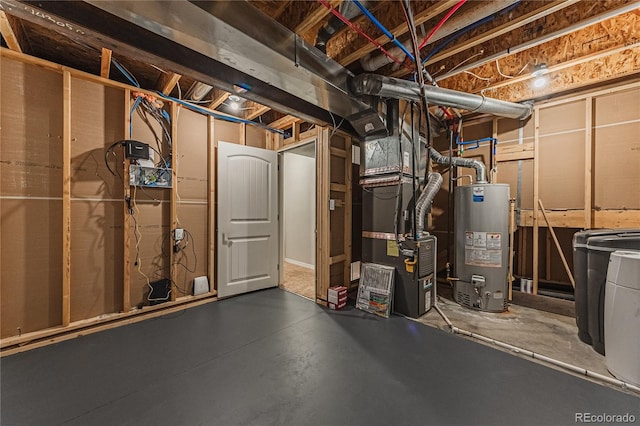 basement featuring heating unit and gas water heater