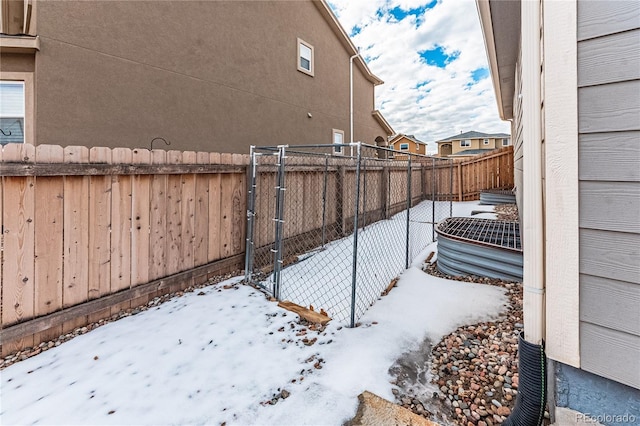 view of yard covered in snow