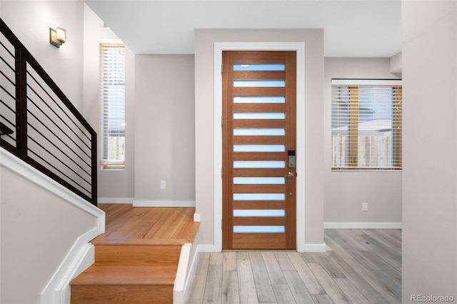 entrance foyer featuring light wood-type flooring