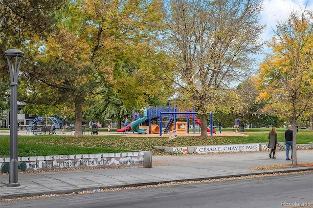 view of play area featuring a lawn