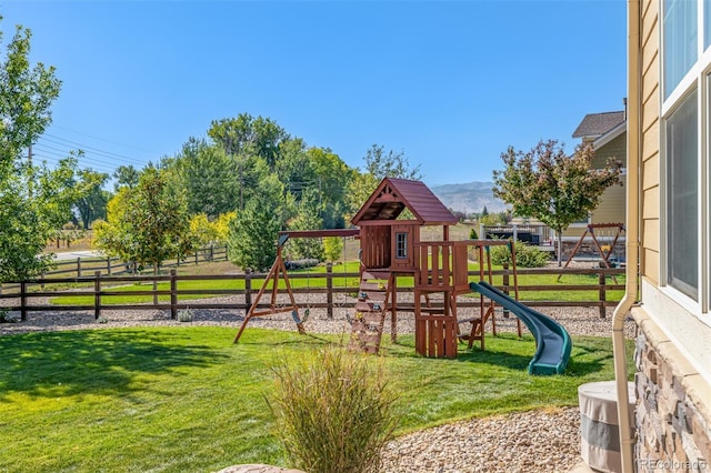 view of playground featuring a yard