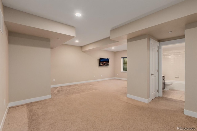 basement with light carpet