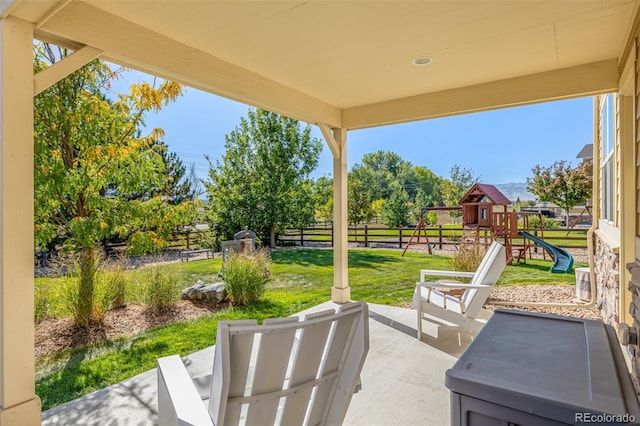 view of patio with a playground