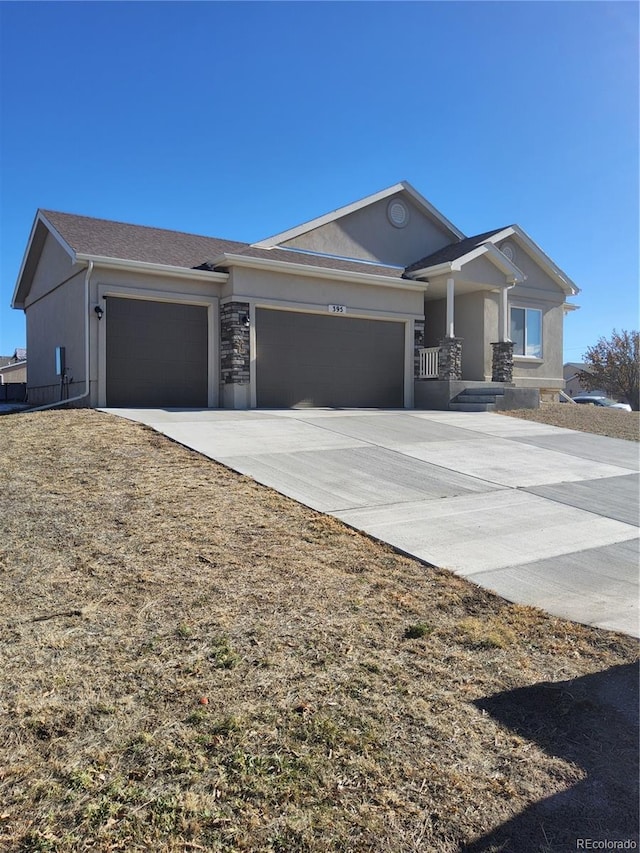 view of front of property featuring a garage