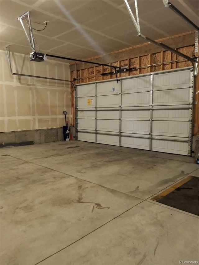 garage featuring a garage door opener