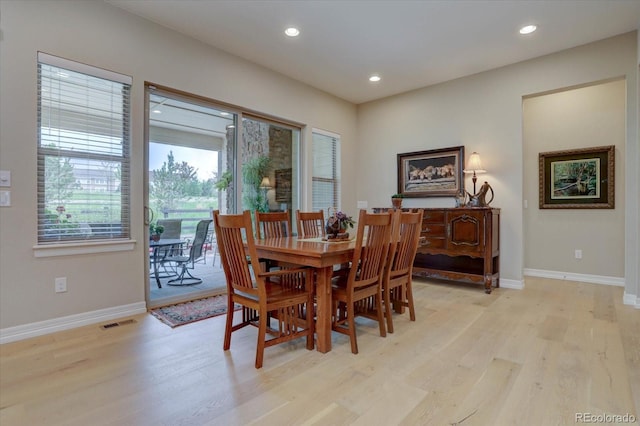 dining room featuring light hardwood / wood-style floors