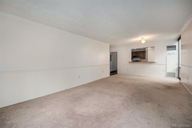 1625 Larimer St Unit 605, Denver, CO 80202 - unfurnished living room with carpet flooring, ornamental molding, and a textured ceiling