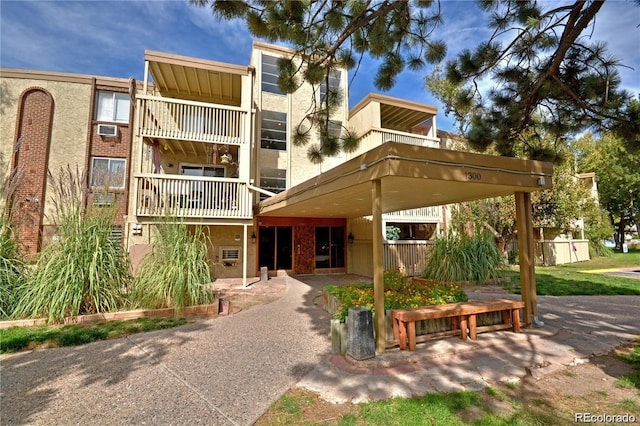 1300 S Parker Rd Unit 9, Denver, CO 80231 - view of building exterior with cooling unit