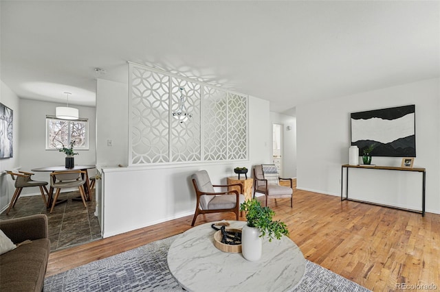 7751 S Race St, Centennial, CO 80122 - living area featuring wood finished floors and baseboards