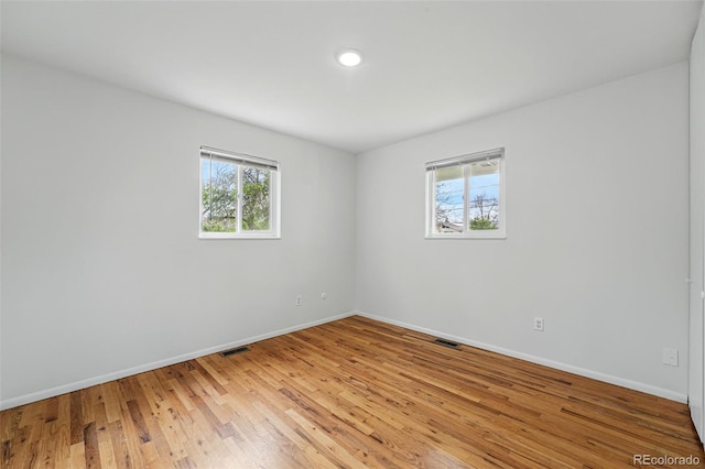 7751 S Race St, Centennial, CO 80122 - unfurnished room featuring baseboards and light wood-type flooring