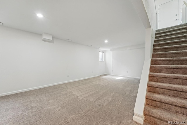 7751 S Race St, Centennial, CO 80122 - basement featuring stairs, recessed lighting, baseboards, and light colored carpet