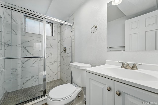 7751 S Race St, Centennial, CO 80122 - full bathroom featuring toilet, a marble finish shower, vanity, and a textured wall