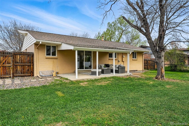 7751 S Race St, Centennial, CO 80122 - back of house featuring brick siding, an outdoor hangout area, and a patio area