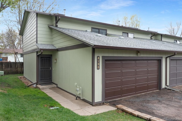 4763 Barnes Rd, Colorado Springs, CO 80917 - view of front facade featuring a shingled roof and a garage