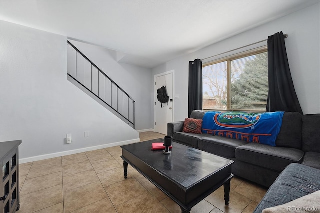 9019 E Oxford Dr, Denver, CO 80237 - living area featuring stairway, baseboards, and light tile patterned flooring