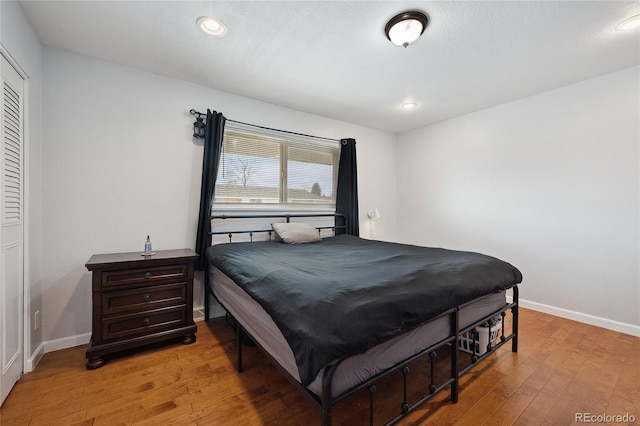 9019 E Oxford Dr, Denver, CO 80237 - bedroom featuring light wood-style floors, baseboards, and recessed lighting