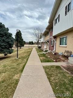 9019 E Oxford Dr, Denver, CO 80237 - view of community with a yard