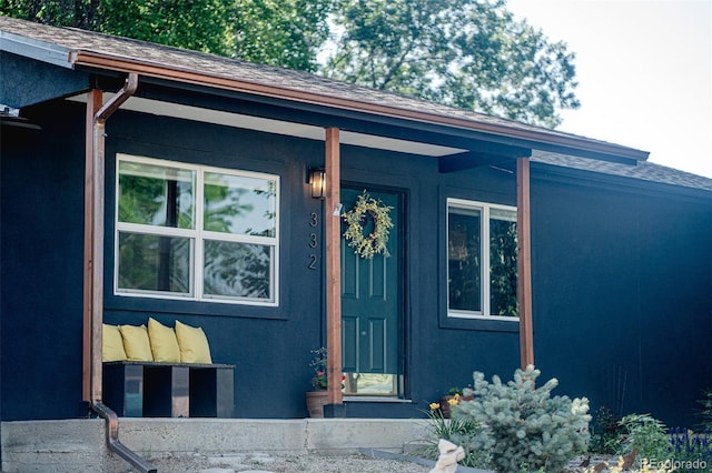 332 Maple Dr, Frederick, CO 80530 - entrance to property featuring stucco siding and a shingled roof