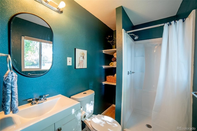 332 Maple Dr, Frederick, CO 80530 - full bath with curtained shower, vanity, a textured wall, and tile patterned floors