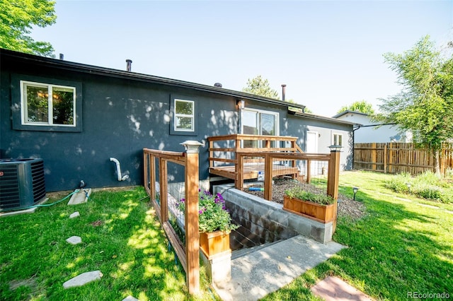 332 Maple Dr, Frederick, CO 80530 - rear view of property with stucco siding