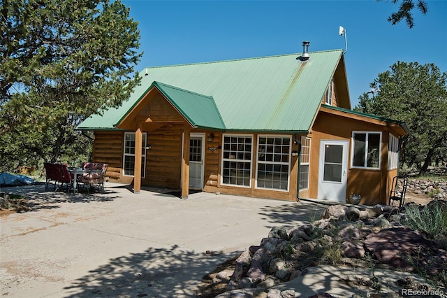 rear view of property with a patio