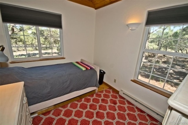 bedroom featuring a baseboard radiator