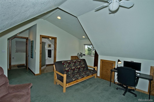 office with a textured ceiling, carpet, lofted ceiling, and ceiling fan