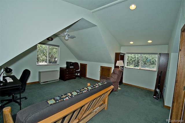 carpeted bedroom with lofted ceiling