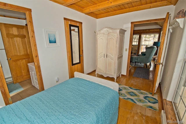 bedroom with wood finished floors, beamed ceiling, baseboard heating, wood ceiling, and a baseboard radiator
