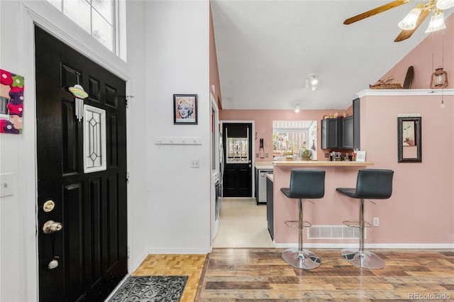 foyer featuring light hardwood / wood-style floors and ceiling fan