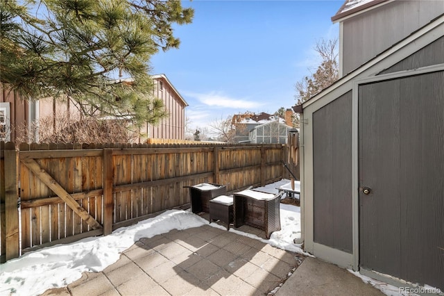 view of snow covered patio