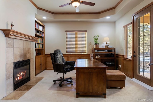 5055 Mcclure Ln, Castle Rock, CO 80108 - office space featuring crown molding, light carpet, built in features, a tile fireplace, and recessed lighting