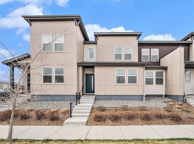 4755 Memphis St Unit 2, Denver, CO 80239 - view of front of property featuring stucco siding