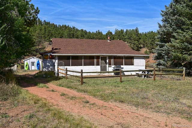 exterior space featuring an outdoor structure