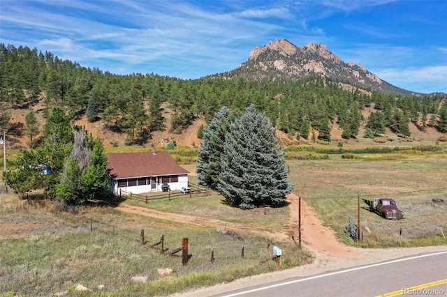 view of mountain feature featuring a rural view