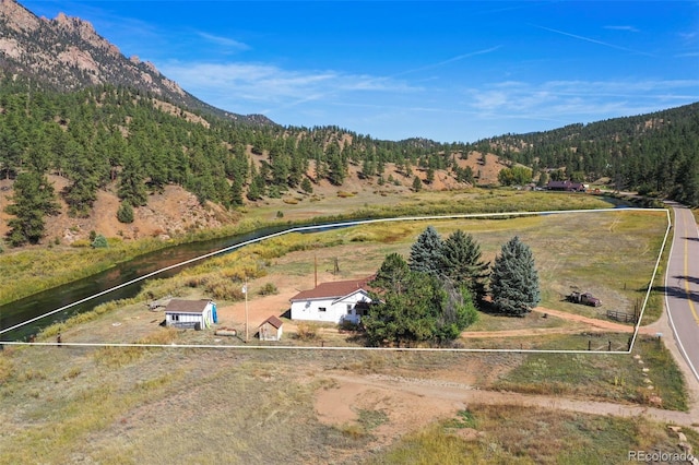 bird's eye view with a rural view and a mountain view