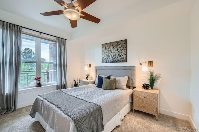 2240 N Clay St Unit 406, Denver, CO 80211 - bedroom with light carpet, baseboards, multiple windows, and a ceiling fan